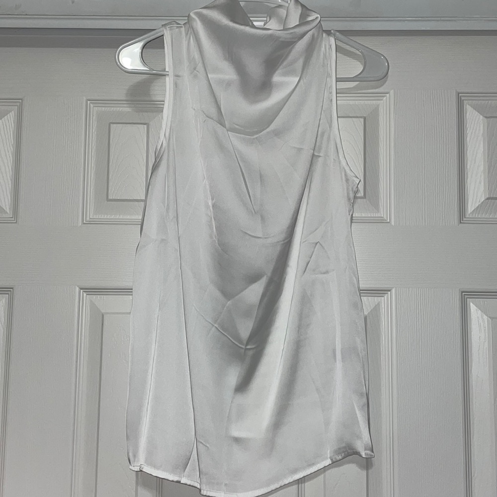 Never worn. I don’t like silky clothing but still super cute